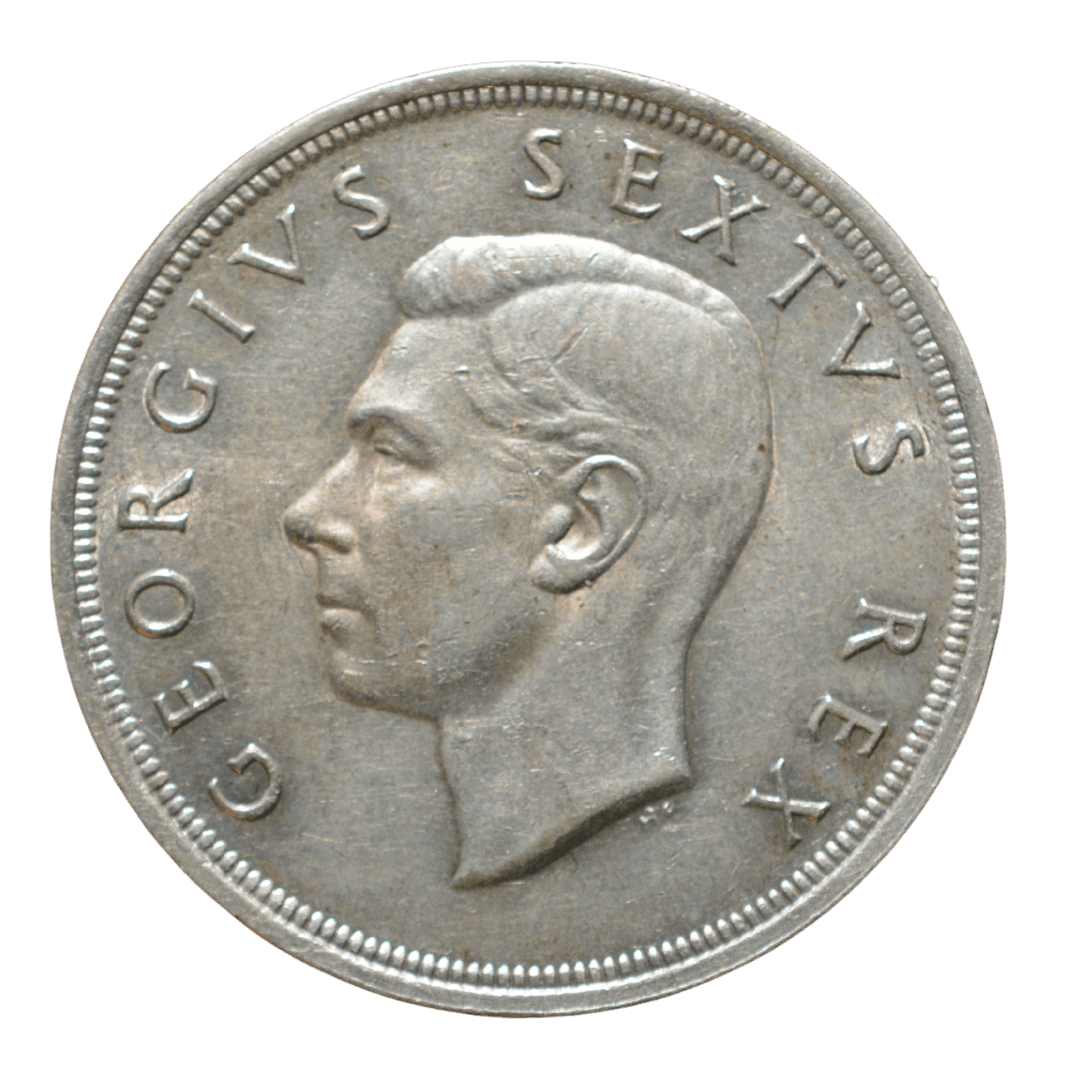 1. 5 Шилінгів (5 Shillings)
2. Південно-Африканський Союз (Union of South Africa)
3. Преторія (South African Mint)
4. Серебро 0.500
5. 28,28 г (чистого срібла 14,14 г)
6. Тираж 138 000 шт.
7. Пам'ятна срібна монета, випущена до 300-річчя заснування Кейптауна (прибуття Яна ван Рібека в 1652 році). На аверсі — портрет короля Георга VI. На реверсі — зображення корабля «Dromedaris» і напис «SOUTH AFRICA • SUID-AFRIKA 1652-1952».
8. 1952 рік
9. Середня рідкість (R2) за каталогами Krause та південноафриканськими довідниками