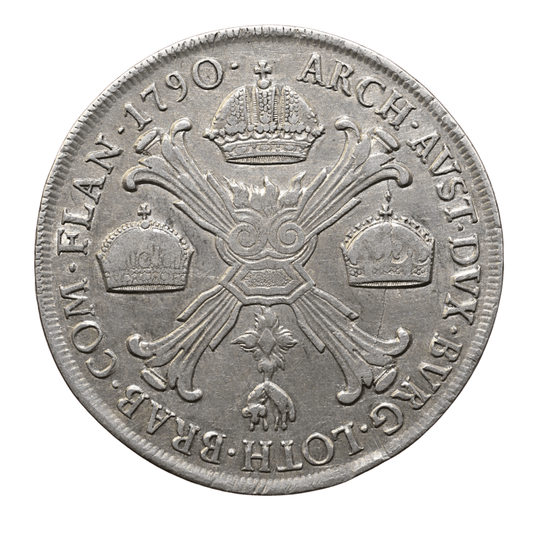 1. 1 Талер (Conventionsthaler)
2. Священна Римська імперія, Ерцгерцогство Австрія (Австрійські Нідерланди)
3. Брюссель або Відень
4. Серебро 0.833
5. ≈ 28,06 г
6. Тираж невідомий (стандартний для того періоду)
7. Срібний талер імператора Йосифа II. На аверсі — портрет імператора в профіль. На реверсі — складна композиція з коронами, скипетрами та геральдичними символами Австрійських земель.
8. 1790 рік
9. Середня рідкість (R2) за каталогами AKS та Krause