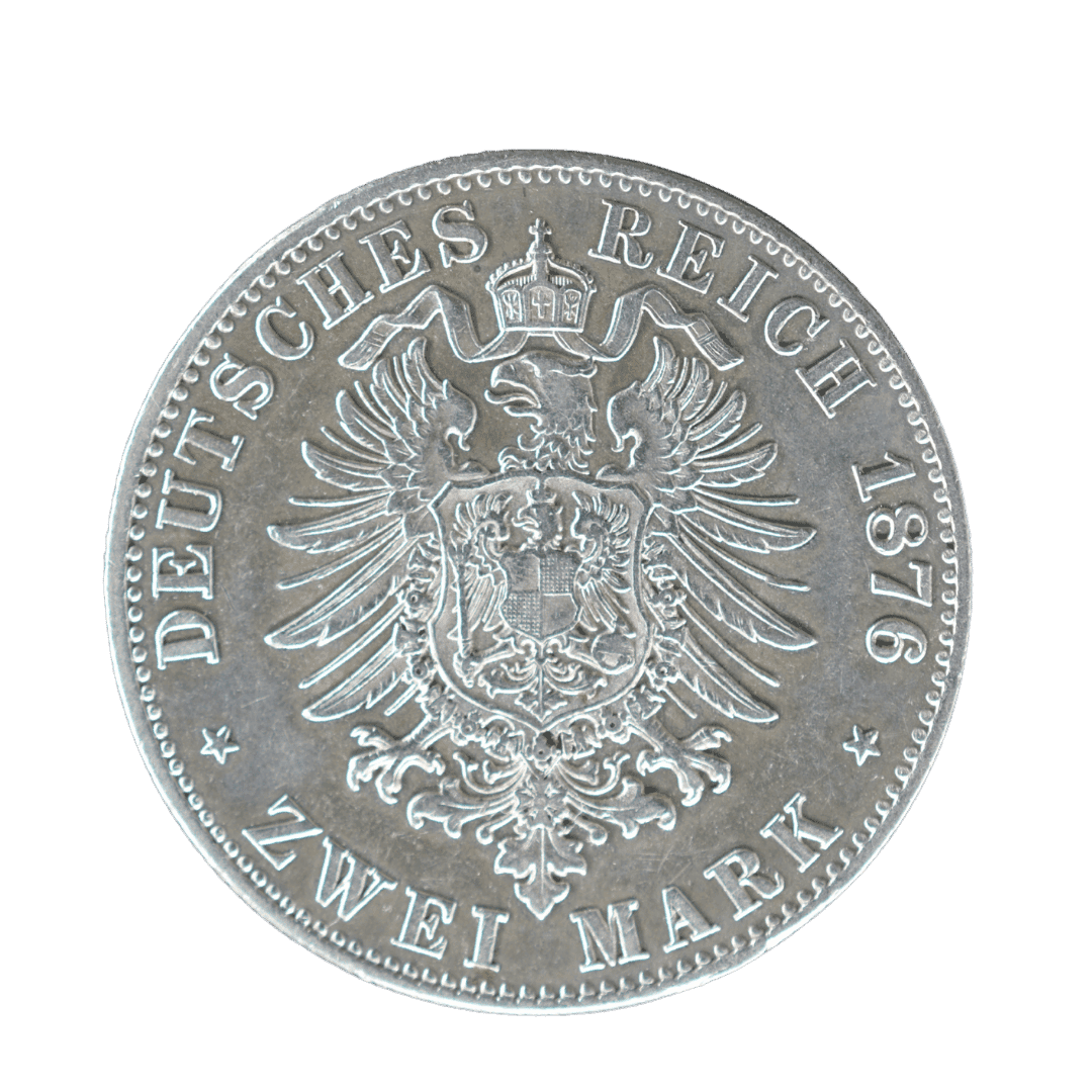 2 марки, Вюртемберг, 1876

Характеристики:

* Країна: Німецька імперія
* Державне утворення: Королівство Вюртемберг
* Номінал: 2 марки
* Рік: 1876
* Правитель: Карл I
* Монетний двір: Штутгарт (F)
* Метал: срібло 900
* Маса: 11,11 г
* Діаметр: 28 мм
* Гурт: рифлений
* Тираж: 1 550 014 шт.  

Опис:
Срібна монета Королівства Вюртемберг часів правління короля Карла I. На аверсі зображений портрет короля праворуч із написом KARL KOENIG VON WUERTTEMBERG («Карл, король Вюртемберга»). На реверсі — імперський орел Німецької імперії під короною, напис DEUTSCHES REICH («Німецька імперія»), дата 1876 та номінал ZWEI MARK («Дві марки»). — фото 2