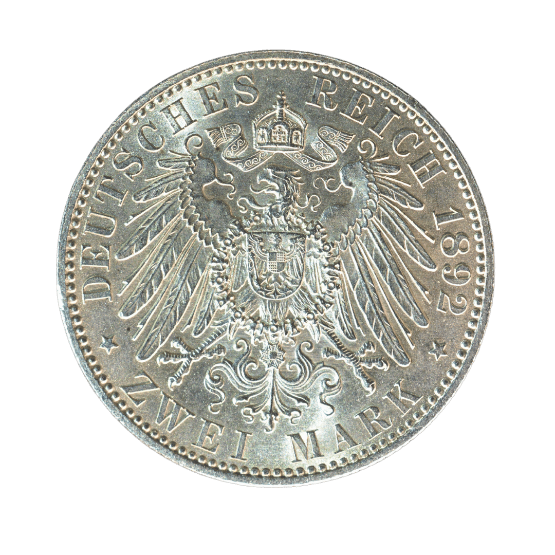 2 марки, Саксен-Веймар-Айзенах, 1892

Опис:
Срібна пам’ятна монета Великого герцогства Саксен-Веймар-Айзенах, випущена на честь золотого весілля Карла Александра та Софії.

Характеристики:

* Держава: Велике герцогство Саксен-Веймар-Айзенах
* Номінал: 2 марки
* Рік: 1892
* Правитель: Карл Александр
* Монетний двір: Берлін (A)
* Метал: срібло (900)
* Маса: 11,11 г
* Діаметр: 28 мм
* Тираж: 50 000 шт. — фото 2