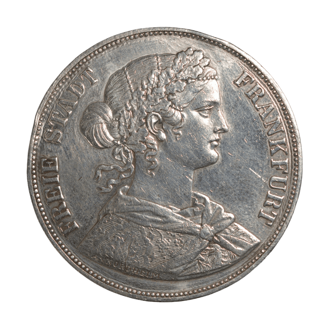 2 ферайнсталери (Doppeltaler), Вільне місто Франкфурт, 1861

Опис

Срібна пам’ятно-обігова монета Вільного міста Франкфурт номіналом 2 ферайнсталери, викарбувана у 1861 році із зображенням алегорії Франкфурта та імперського орла.

Характеристики

* Країна: Вільне місто Франкфурт
* Номінал: 2 ферайнсталери (Doppeltaler)
* Рік: 1861
* Правитель / емітент: Вільне місто Франкфурт
* Метал: срібло (900)
* Вага: 37,04 г
* Діаметр: 41 мм
* Тираж: 1 786 588 шт.  
* Гурт: напис STARK IM RECHT («Сильний у праві»)
* Аверс: FREIE STADT FRANKFURT («Вільне місто Франкфурт»); алегоричне зображення Франкфурта.
* Реверс: ZWEI VEREINSTHALER («Два ферайнсталери»), XV EIN PFUND FEIN («1/15 фунта чистого срібла»); імперський орел, унизу дата 1861.

Примітка

Досить поширений серед великих срібних німецьких монет XIX століття тип. Незважаючи на значний тираж, користується стабільним попитом завдяки великому формату, ефектному дизайну та тому, що це саме Doppeltaler (2 ферайнсталери), а не звичайний Vereinsthaler.