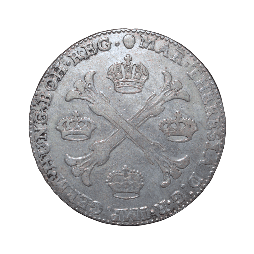 1 Kronenthaler (Couronne), 1764, Мария Терезия. МД — Bruxelles (Брюссель) ✅
Тип: Кроненталер, Австрийские Нидерланды (Брабант), серебро
Основные характеристики:
— Страна: Австрийские Нидерланды (Brabant)
— Номинал: 1 Kronenthaler / Couronne
— Год: 1764
— Правитель: Мария Терезия (Maria Theresia, 1740–1780)
— Материал: Серебро 873/1000 (0.873)
— Вес: 29.44 г
— Диаметр: 41 мм
— Монетный двор: Bruxelles (знак — голова ангела)
— Тираж: 1 868 021 шт.
На что обратить внимание:
Аверс — бургундский крест (Andreaskreuz) с четырьмя коронами. Реверс — двуглавый орёл с гербом. Гурт: JUSTITIA ET CLEMENTIA.
