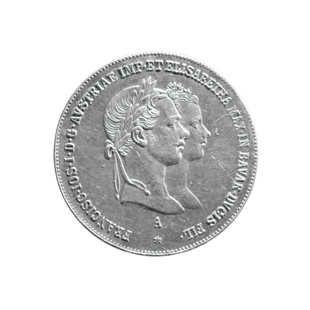 2 Gulden, 1854, Франц Иосиф I и Елизавета. МД — A = Wien (Вена) ✅
Тип: Свадебный 2 гульдена (Hochzeitstaler), Австрийская империя, серебро
Основные характеристики:
— Страна: Австрийская империя
— Номинал: 2 Gulden
— Год: 1854 (свадьба 24 апреля)
— Правитель: Франц Иосиф I и Елизавета Баварская (Сисси)
— Материал: Серебро 900/1000
— Вес: ~25.9 г
— Диаметр: 36 мм
— Монетный двор: A = Wien
— Тираж: Не уверен
На что обратить внимание:
Памятная монета на свадьбу Франца Иосифа и Сисси. Сцена венчания с епископом. Гурт: ZWEI GULDEN XII EINE F.W.M.