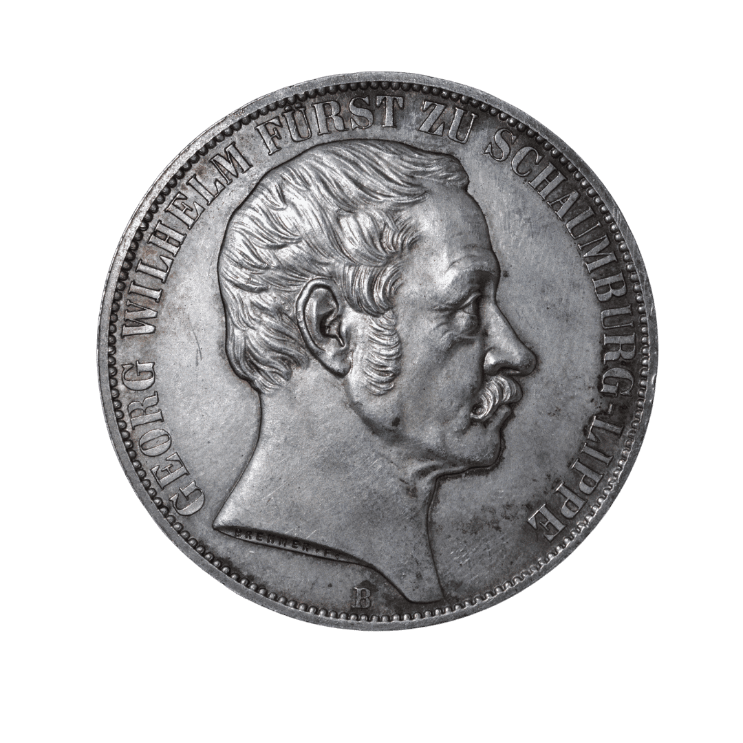 * Номинал: 2 талера (Doppeltaler)
* Год: 1857
* Государство: княжество Шаумбург-Липпе
* Правитель: Георг Вильгельм, 1807–1860
* Повод: 50-летие его правления
* Монетный двор: Ганновер
* Знак: B, связанный с минцмейстером Теодором Вильгельмом Брюэлем
* Гравёр: Heinrich Friedrich Brehmer
* Серебро: 900
* Вес: около 37,04 г
* Диаметр: около 41 мм
* Тираж: всего 2 000 штук
* Гурт: MITT GOTTES HÜLFE