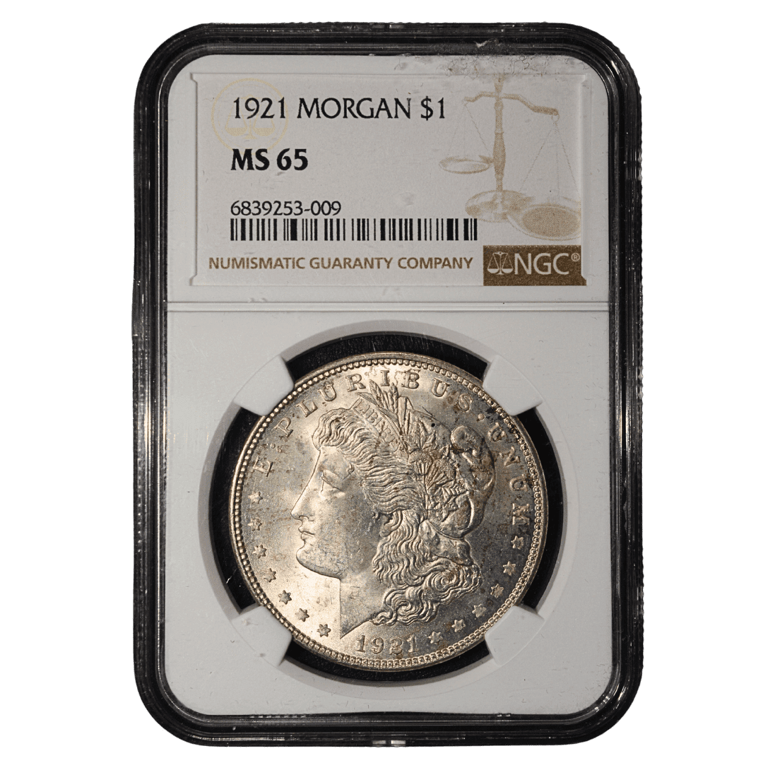 United States 1 Dollar 1921 NGC MS65 

Morgan Dollar 1921 — $1

Опис:
Срібний долар США типу Morgan, 1921 року, без позначення монетного двору. На аверсі — портрет Свободи роботи Джорджа Т. Моргана, на реверсі — орел із розпростертими крилами.

Характеристики:

* Країна: США
* Номінал: 1 долар
* Рік: 1921
* Монетний двір: Філадельфія
* Метал: срібло (900)
* Вага: 26,73 г
* Діаметр: 38,1 мм
* Тираж: 44 690 000
* Грейд: NGC MS 65
* NGC Population MS 65: 10 395 шт.  

Примітка:
За даними NGC, у грейді MS 65 сертифіковано 10 395 екземплярів цієї монети. Загалом NGC сертифікувала понад 200 тисяч Morgan Dollar 1921 року.  

Написи:
E PLURIBUS UNUM — «З багатьох — єдине»;
IN GOD WE TRUST — «На Бога ми уповаємо»;
UNITED STATES OF AMERICA — «Сполучені Штати Америки».