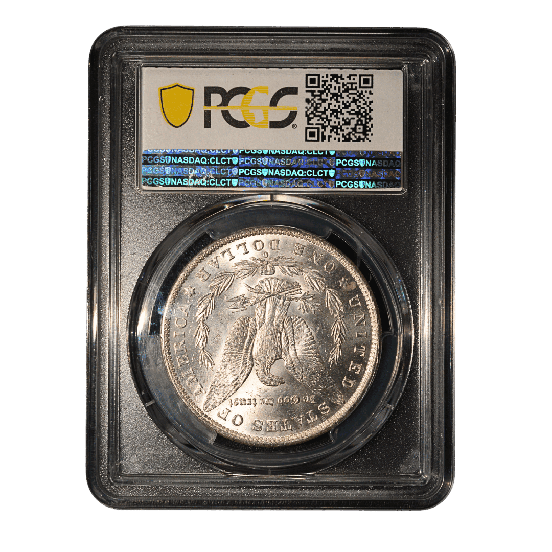 United States 1 Dollar 1884 O PCGS MS63

Morgan Dollar 1884-O — $1

Опис:
Срібний долар США типу Morgan, 1884 року, викарбуваний на монетному дворі Нового Орлеана. На аверсі — Свобода, на реверсі — орел із розпростертими крилами.

Характеристики:

* Країна: США
* Номінал: 1 долар
* Рік: 1884
* Монетний двір: Новий Орлеан (O)
* Метал: срібло (900)
* Вага: 26,73 г
* Діаметр: 38,10 мм
* Тираж: 9 730 000
* Грейд: PCGS MS 63
* PCGS Population MS 63: 110 788 шт.  

Примітка:
За актуальним звітом PCGS, для 1884-O Morgan Dollar у грейді MS 63 сертифіковано 110 788 екземплярів. Population є кількістю монет, сертифікованих саме PCGS, а не оцінкою загальної кількості монет, що збереглися. — фото 2