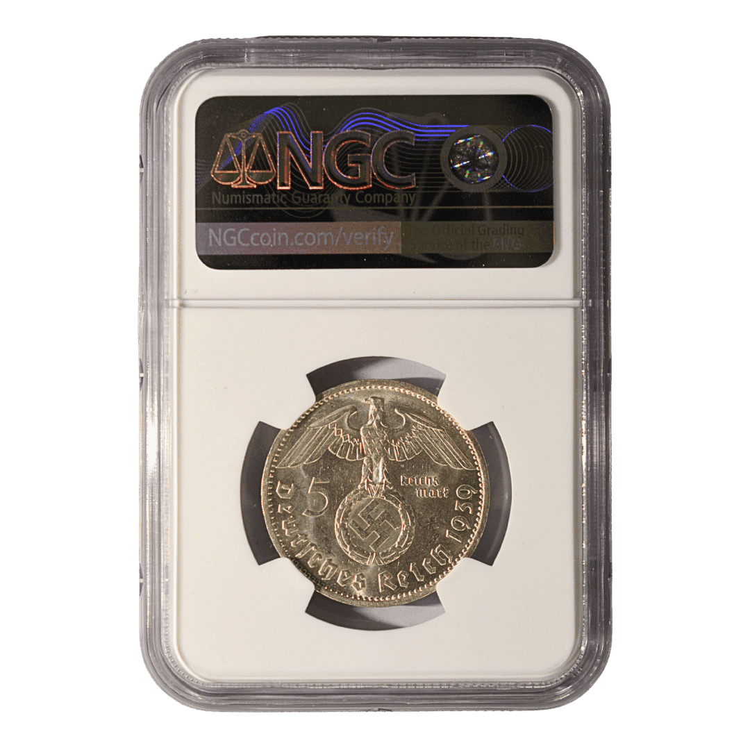 Germany - Third Reich 5 Reichsmark 1939 J NGC MS62

5 рейхсмарок 1939 — Пауль фон Гинденбург

Описание:
Серебряная монета номиналом 5 рейхсмарок с портретом Пауля фон Гинденбурга. На реверсе — государственный орёл со свастикой в дубовом венке.

Характеристики:

* Номинал: 5 рейхсмарок
* Год: 1939
* Монетный двор: не определён по представленным изображениям
* Государство: Германский рейх
* Металл: серебро (900)
* Вес: 13,88 г
* Диаметр: 29 мм
* Грейд: NGC MS62
* Сертификат NGC: 6774028-018
* Тираж: не указываю без определения монетного двора

Основные характеристики типа подтверждаются каталогом Numista: серебро 900 пробы, 13,88 г, диаметр 29 мм, KM#94.  

Примечание:
Экземпляр сертифицирован NGC в MS62. Population NGC для этого конкретного экземпляра я сейчас не указываю без подтверждения по базе NGC. — фото 2
